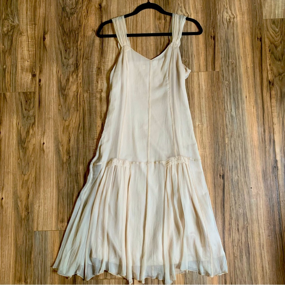 D. Exterior Silk pleated dress size 48